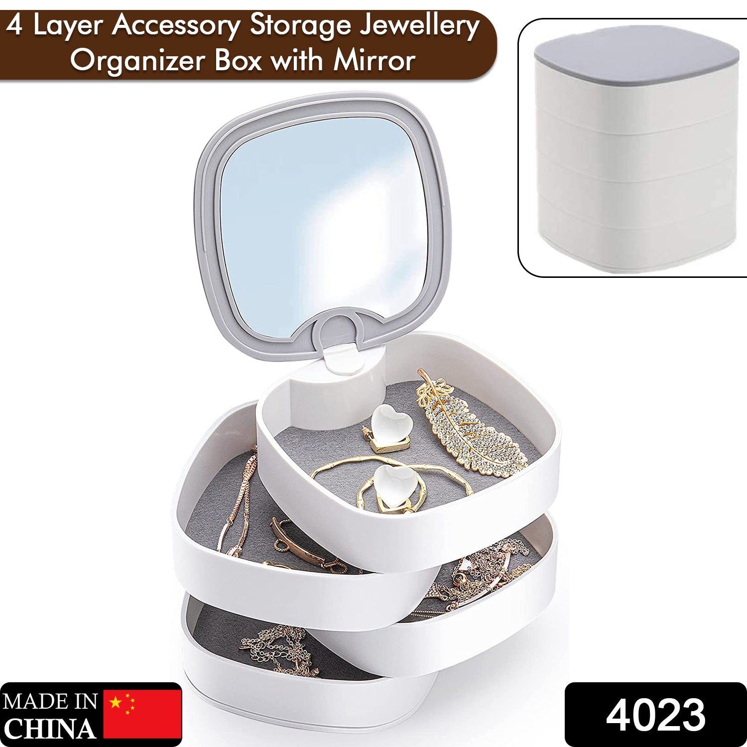Close-up of rotating jewelry box with mirror and multicolor layers Close-up of rotating jewelry box with mirror and multicolor layers